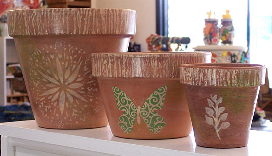 Terra cotta pots decorated with paint and stencils