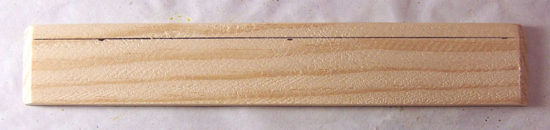 Mitered wood strip with drawn line