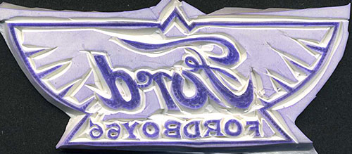 Design elements of the stamp have been outlined with an X-acto knife.